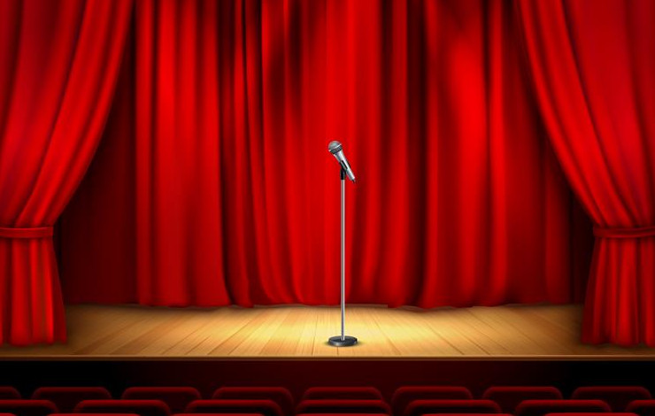 Imagen vectorizada de un escenario vacío de un teatro con un micrófono en medio