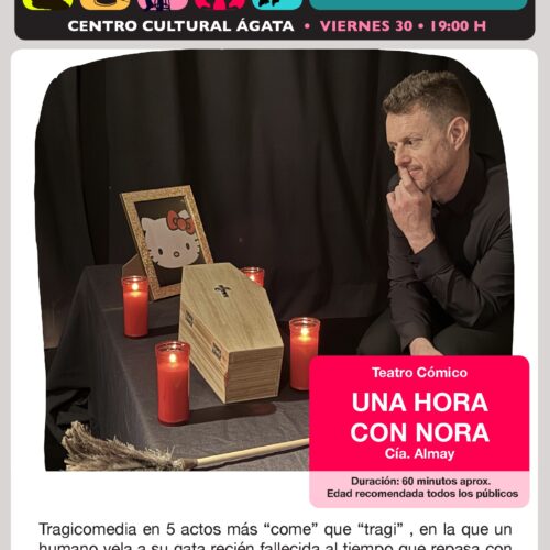 Un hombre ante el ataúd de su gato muerto