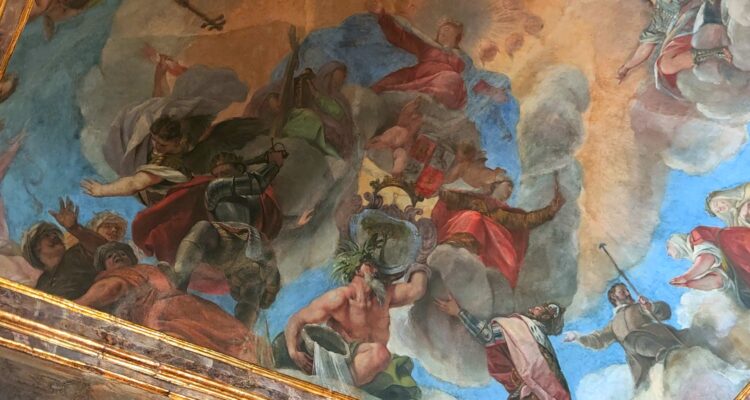 La Virgen María sobre las alegorías de la religión y la Villa de Madrid, y por debajo, San Miguel, San Hermenegildo, la alegoría del Río Manzanares y Fernando III el Santo