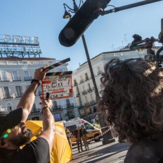 Imagen de un rodaje en la Puerta del Sol de Madrid